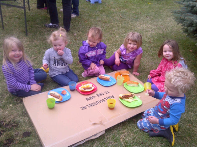 The CFY kids enjoying BBQ at garage sale
